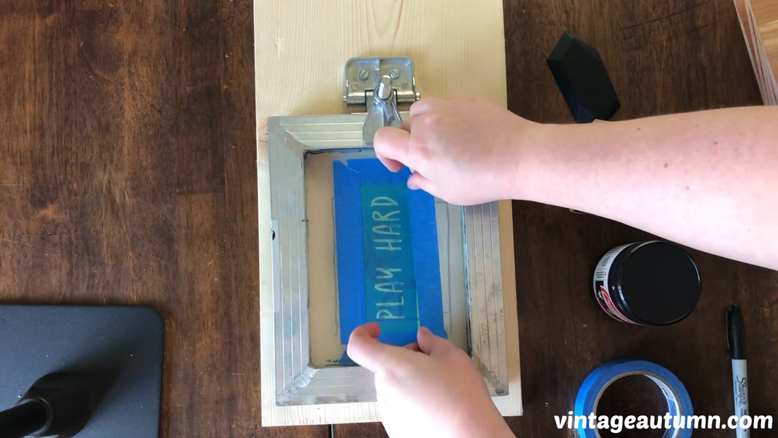 mount stencil to frame for diy can koozies