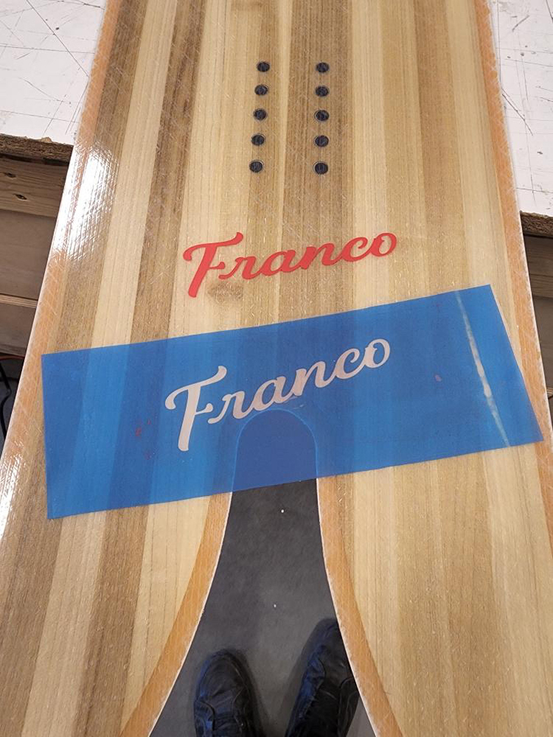 custom snowboard with logo and ikonart stencil